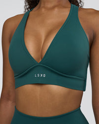 Woman wearing Stamina Sports Bra D/DD/E - Transformative Teal | Model:Jordan | Size:XS