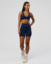 Woman wearing Stamina Sports Bra - Future Navy | Model:Brylee | Size:XS | Thumbnail Index: 3