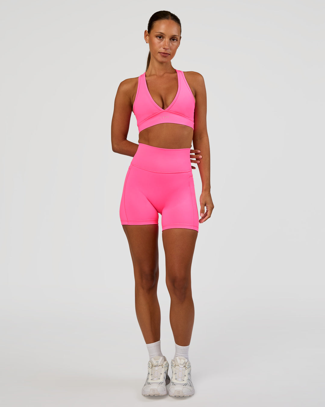 Woman wearing Stamina Sports Bra - Sugar Plum | Model:Brylee | Size:XS