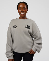 Woman wearing Static Grit Boxy Crew - Alloy-Black | Model:Ellie | Size:XS