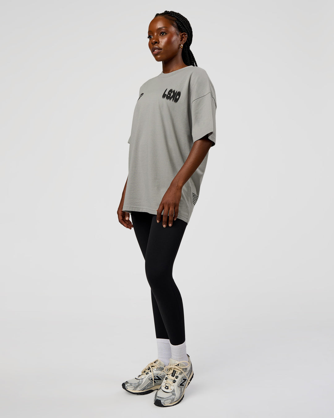 Woman wearing Static Grit Heavyweight Oversized Tee - Alloy-Black | Model:Ellie | Size:XS