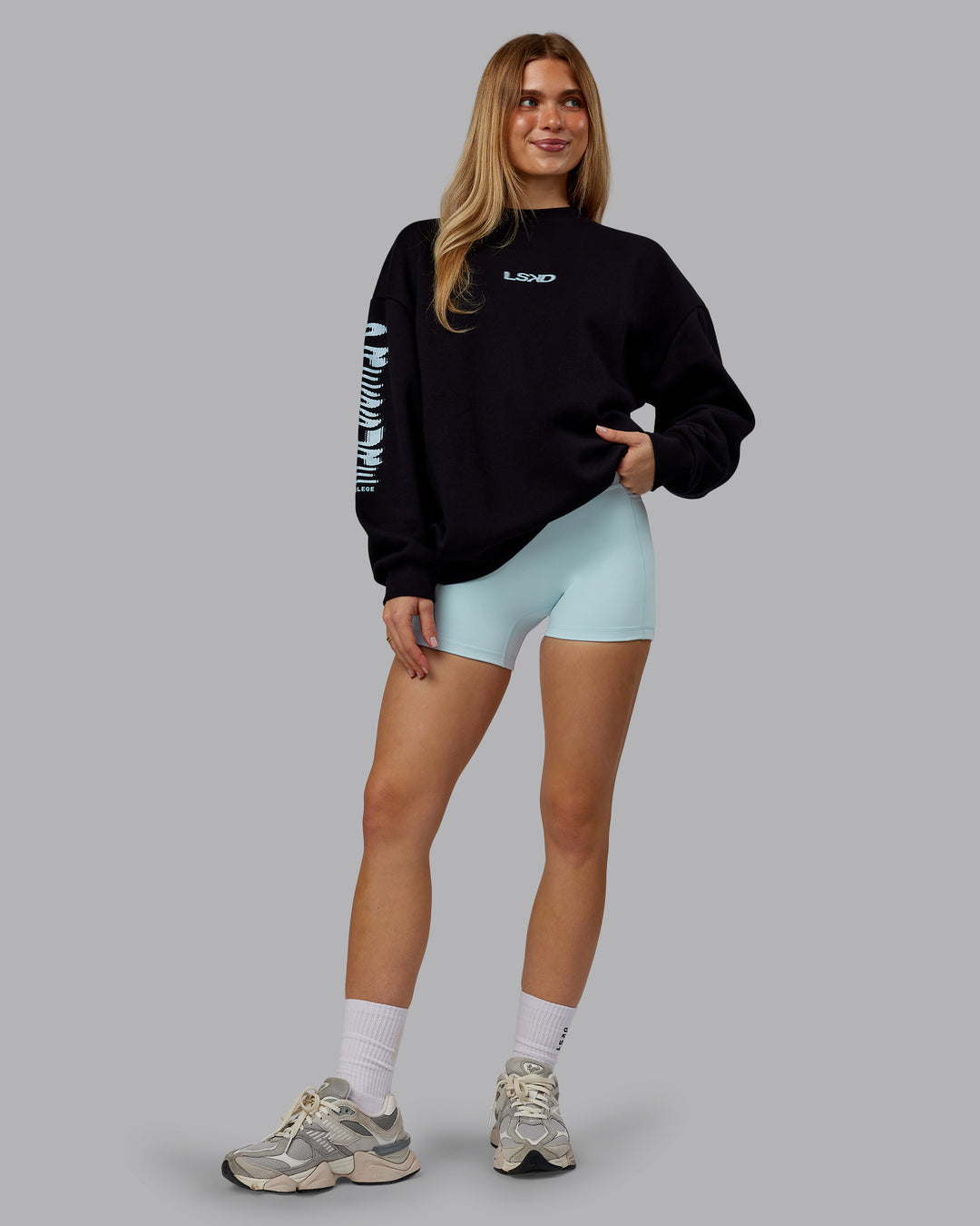 Woman wearing Static Oversized Sweater - Black-Skyride | Model:Emilie | Size:XS