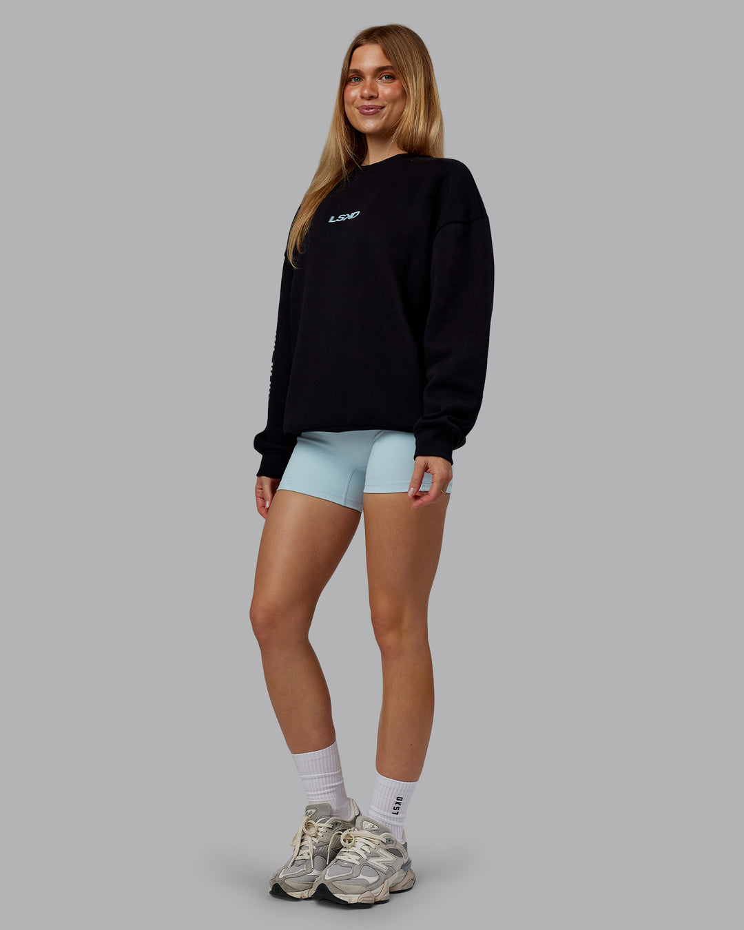 Woman wearing Static Oversized Sweater - Black-Skyride | Model:Emilie | Size:XS