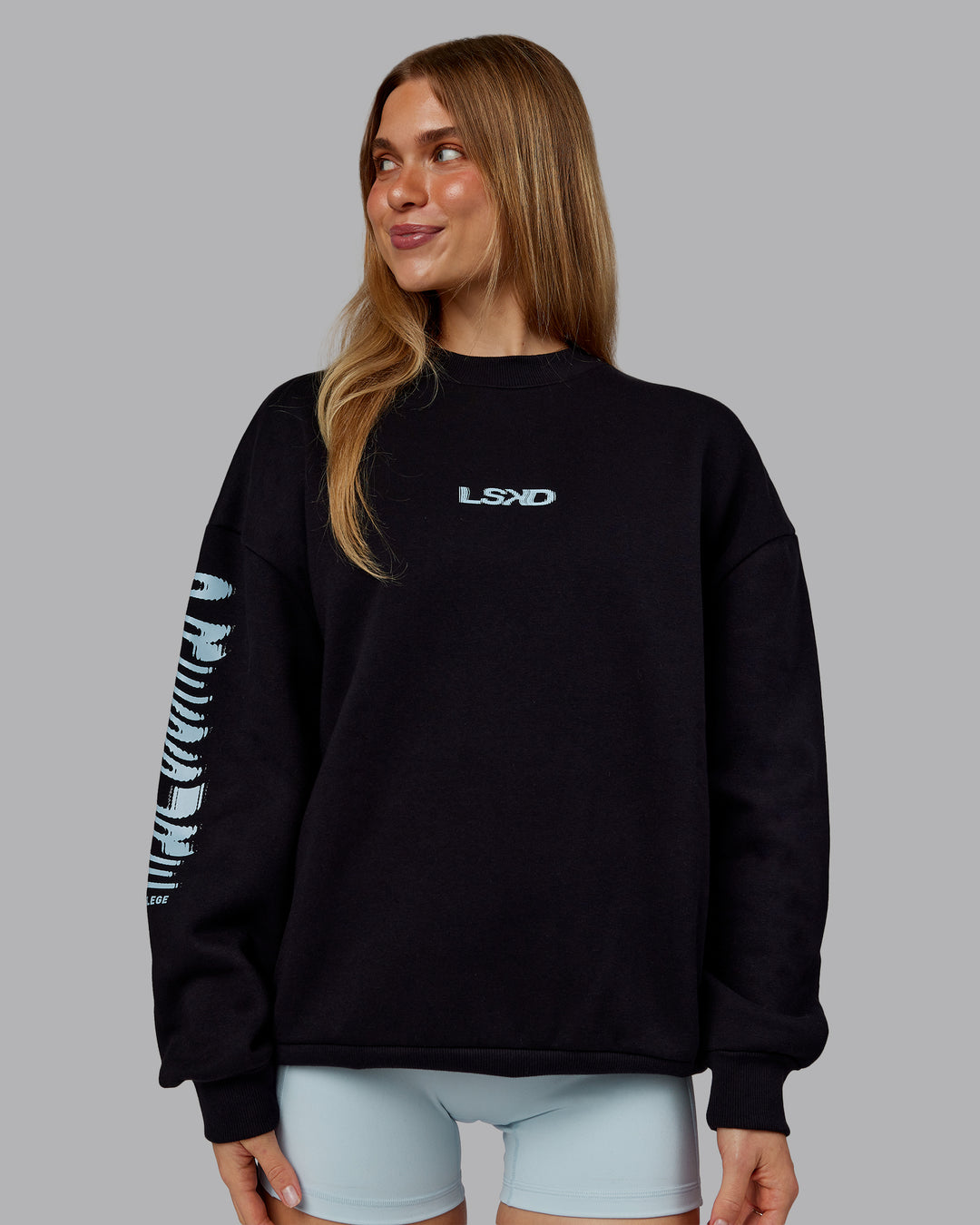 Woman wearing Static Oversized Sweater - Black-Skyride | Model:Emilie | Size:XS