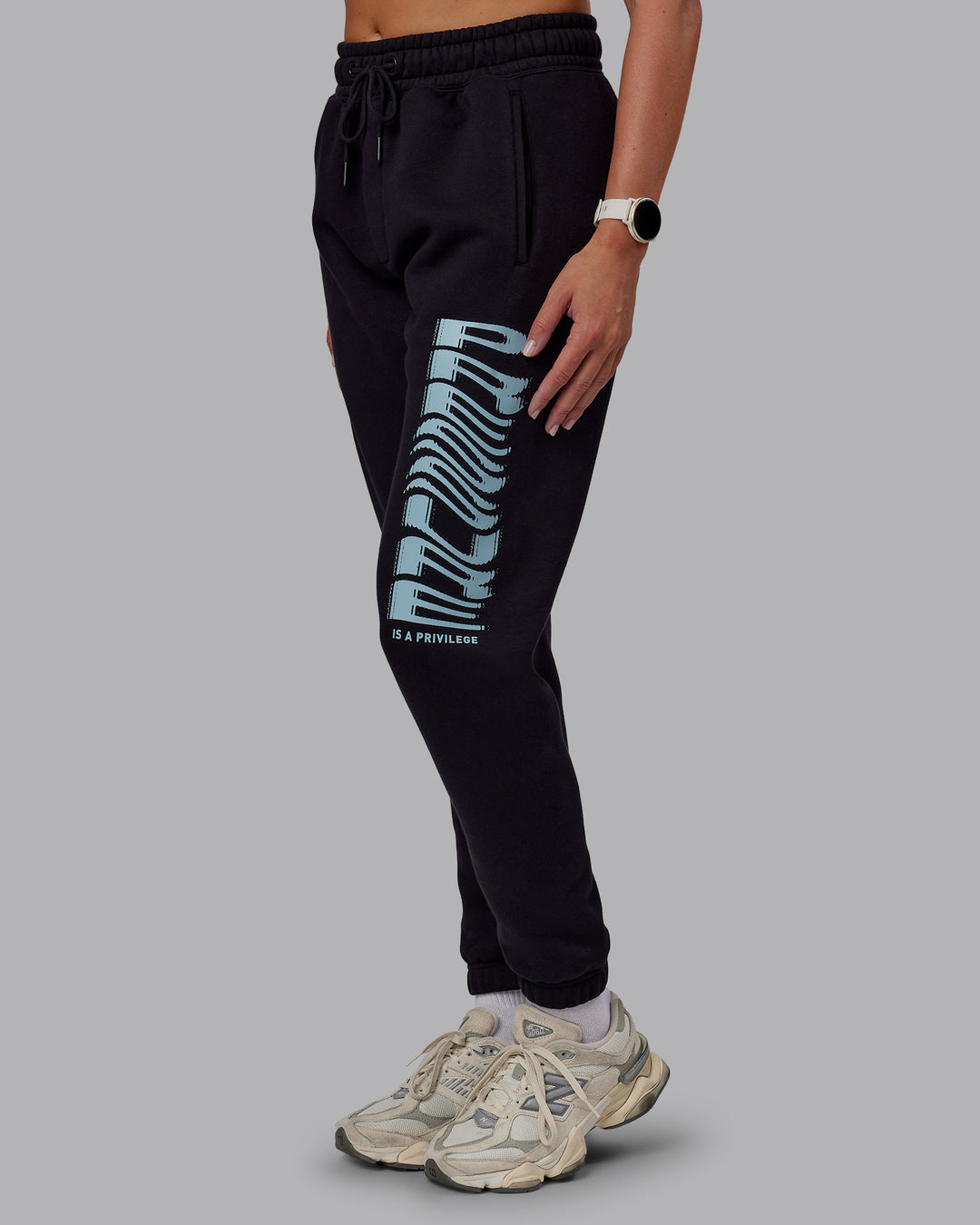 Woman wearing Static Track Pant - Black-Skyride | Model:Phoebe | Size:XS