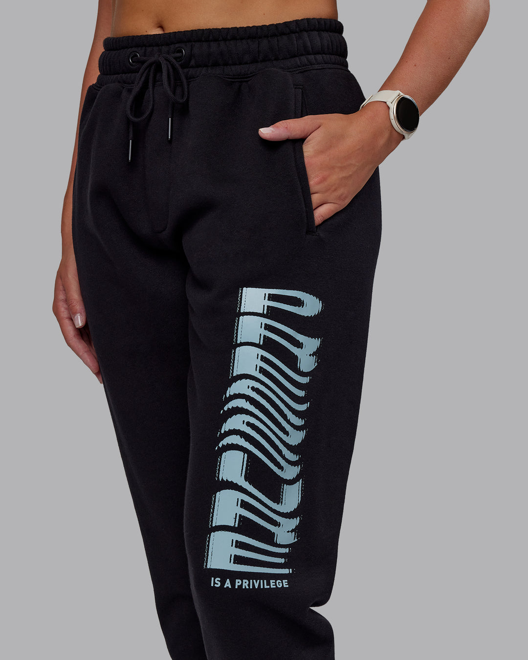 Woman wearing Static Track Pant - Black-Skyride | Model:Phoebe | Size:XS