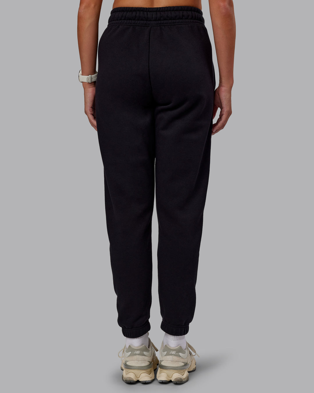 Woman wearing Static Track Pant - Black-Skyride | Model:Phoebe | Size:XS