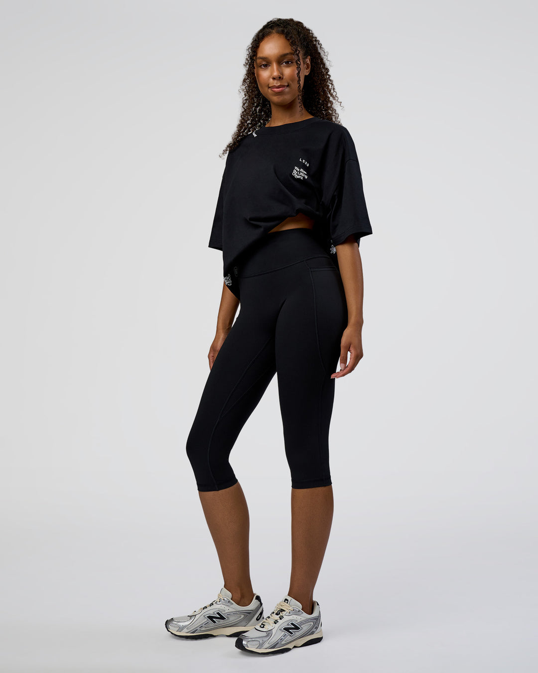 Woman wearing Sticker Heavyweight Oversized Tee - Black-White | Model:Jordan | Size:XS