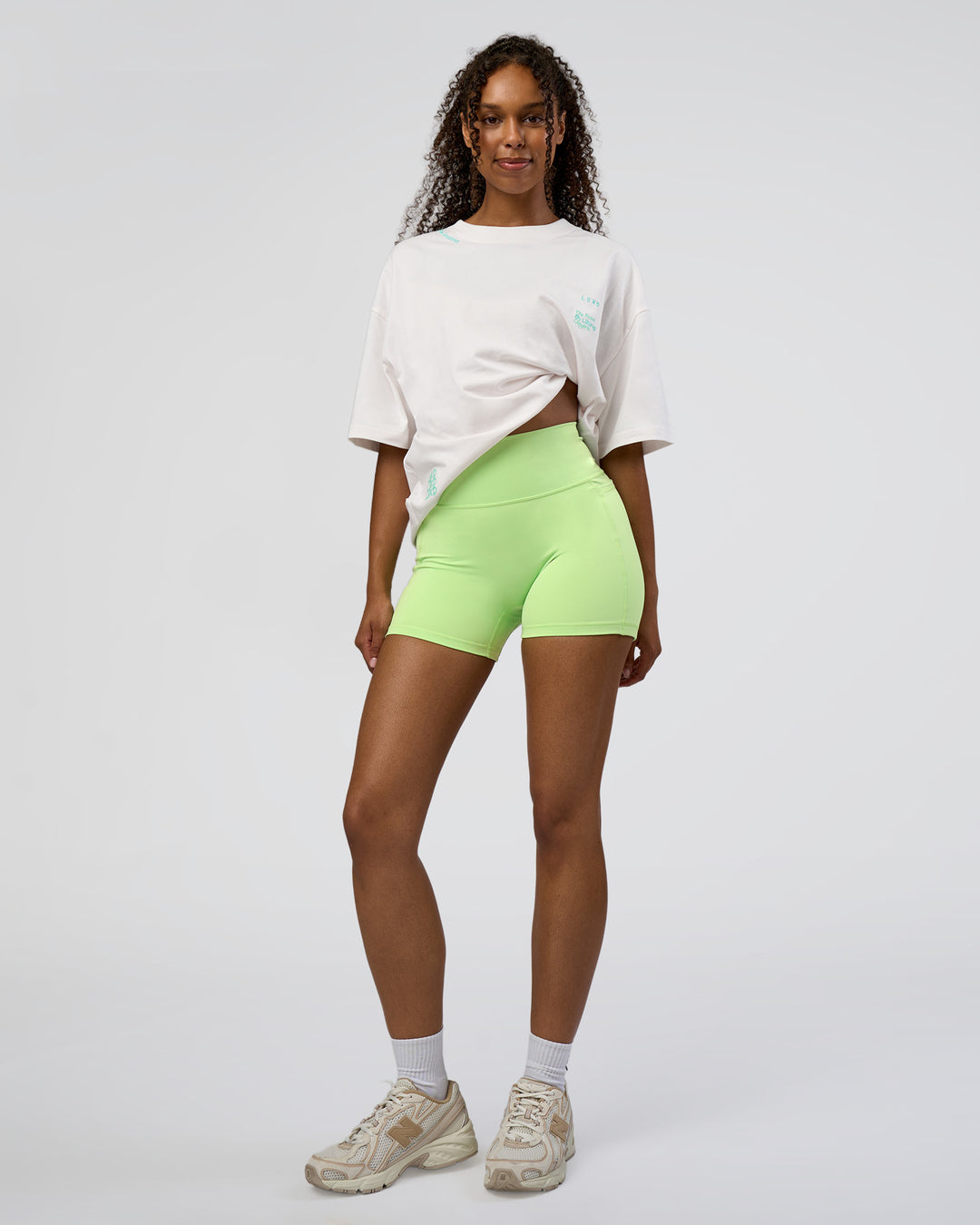 Woman wearing Sticker Heavyweight Oversized Tee - Off White-Jelly Mint | Model:Jordan | Size:XS