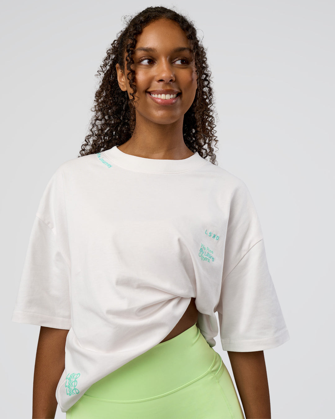 Woman wearing Sticker Heavyweight Oversized Tee - Off White-Jelly Mint | Model:Jordan | Size:XS