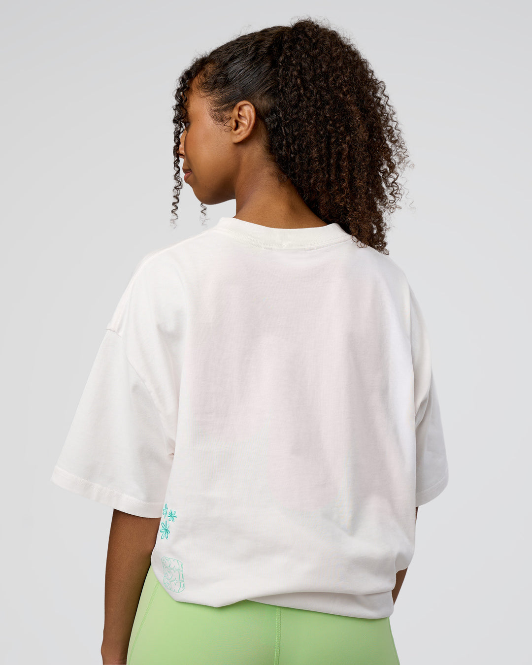 Woman wearing Sticker Heavyweight Oversized Tee - Off White-Jelly Mint | Model:Jordan | Size:XS