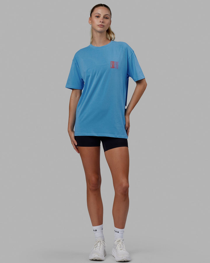 Woman wearing Unisex Stretch It FLXCotton Tee Oversize - Azure Blue