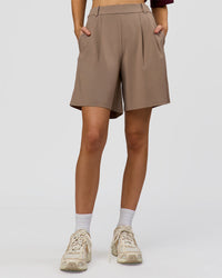 Woman wearing StretchShift Wide Leg Short - Taupe Ash | Model:Leilani | Size:XS