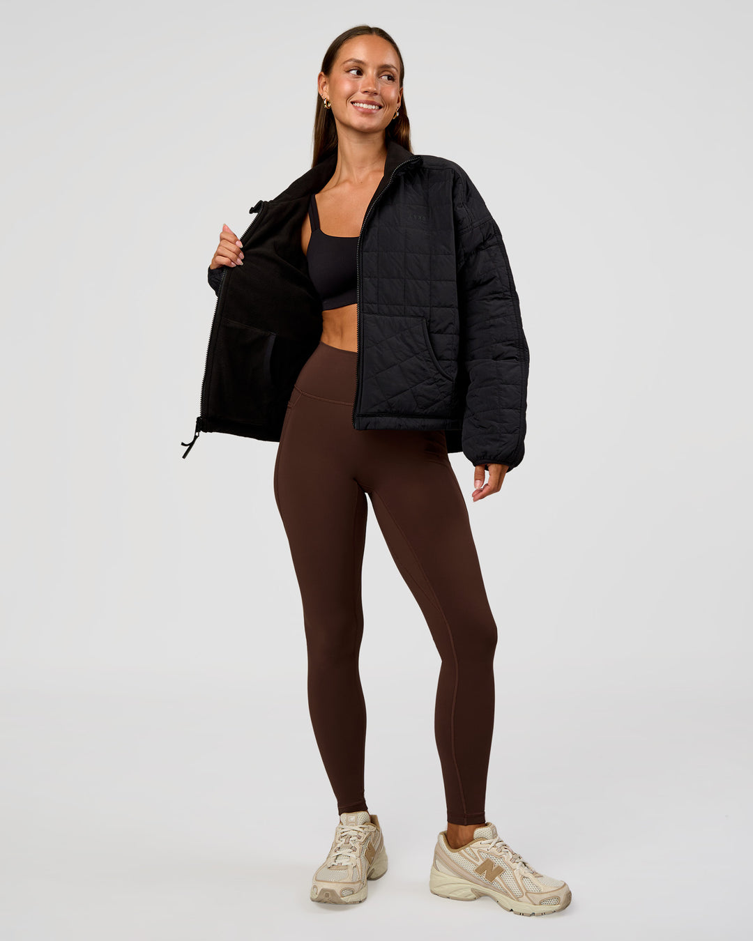 Woman wearing Thrive Reversible Jacket - Black | Model:Brylee | Size:XS