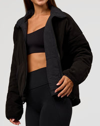 Woman wearing Thrive Reversible Jacket - Black | Model:Brylee | Size:XS