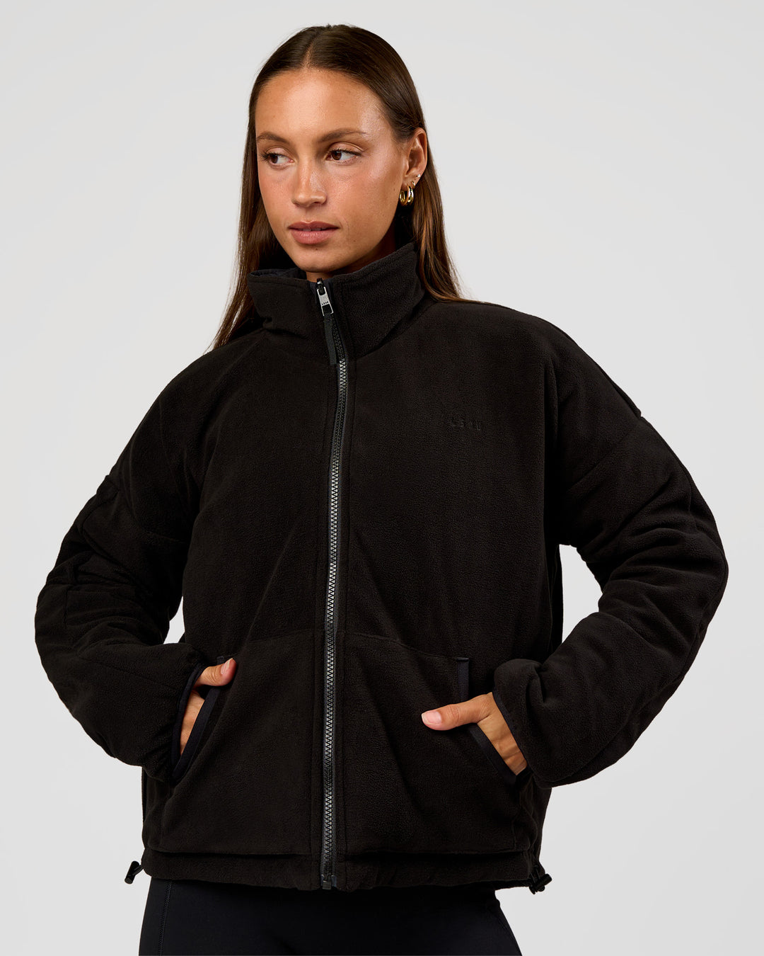 Woman wearing Thrive Reversible Jacket - Black | Model:Brylee | Size:XS