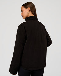 Woman wearing Thrive Reversible Jacket - Black | Model:Brylee | Size:XS