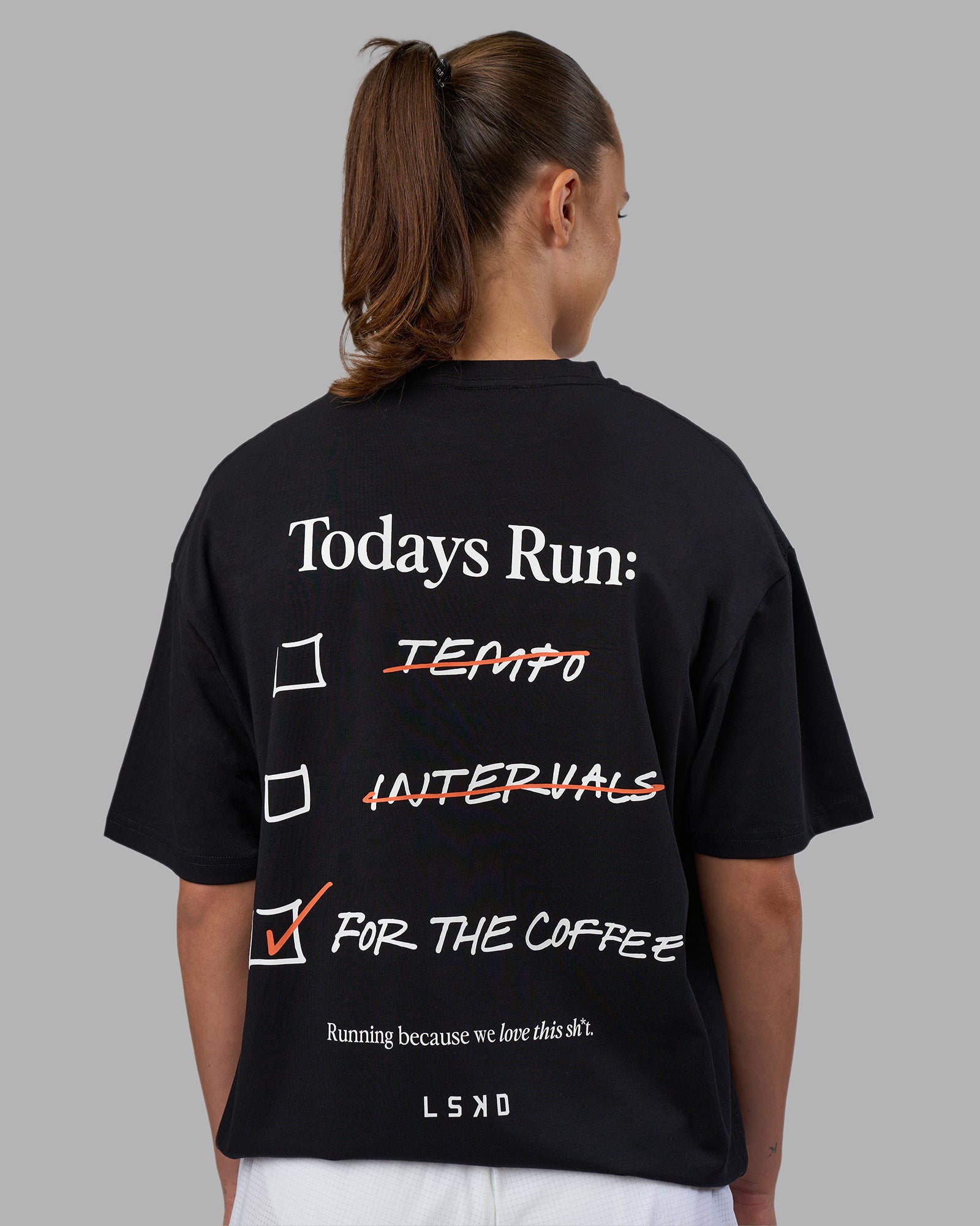 Woman wearing Today's Run FLXCotton Oversized Tee - Black-White | Model:Charlize | Size:XS
