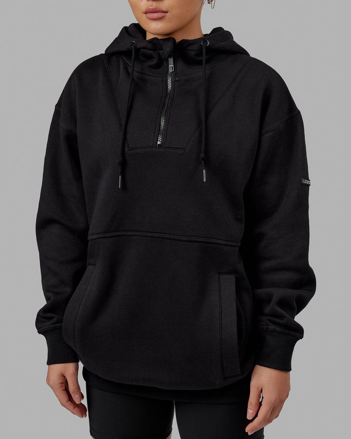 Woman wearing Unisex Trek Hoodie Oversize - Black