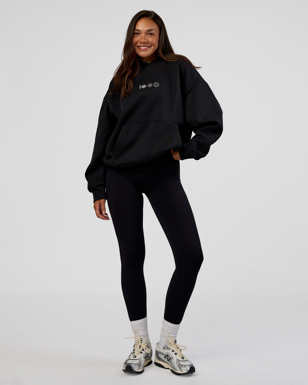 Woman wearing Trust The Process Unisex Oversized Hoodie - Black-White | Model:Kirstyn | Size:XS
