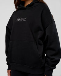 Woman wearing Trust The Process Unisex Oversized Hoodie - Black-White | Model:Kirstyn | Size:XS