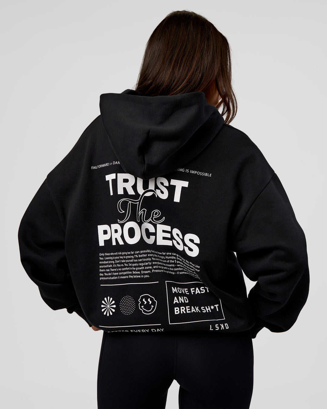Woman wearing Trust The Process Unisex Oversized Hoodie - Black-White | Model:Kirstyn | Size:XS