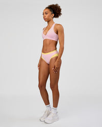 Woman wearing Turbo Track Brief in Marshmallow-Lemon | Model:Txai | Size:XS