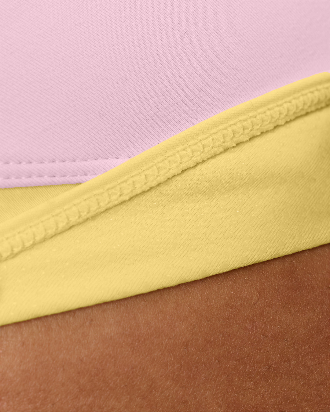 Woman wearing Turbo Track Brief in Marshmallow-Lemon | Model:Txai | Size:XS