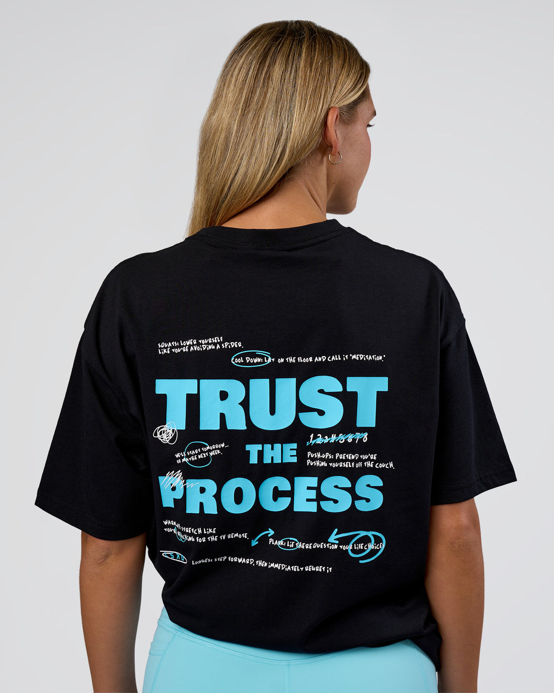 Woman wearing Unfit Club FLXCotton Oversized Tee - Black-White | Model:Amity | Size:XS