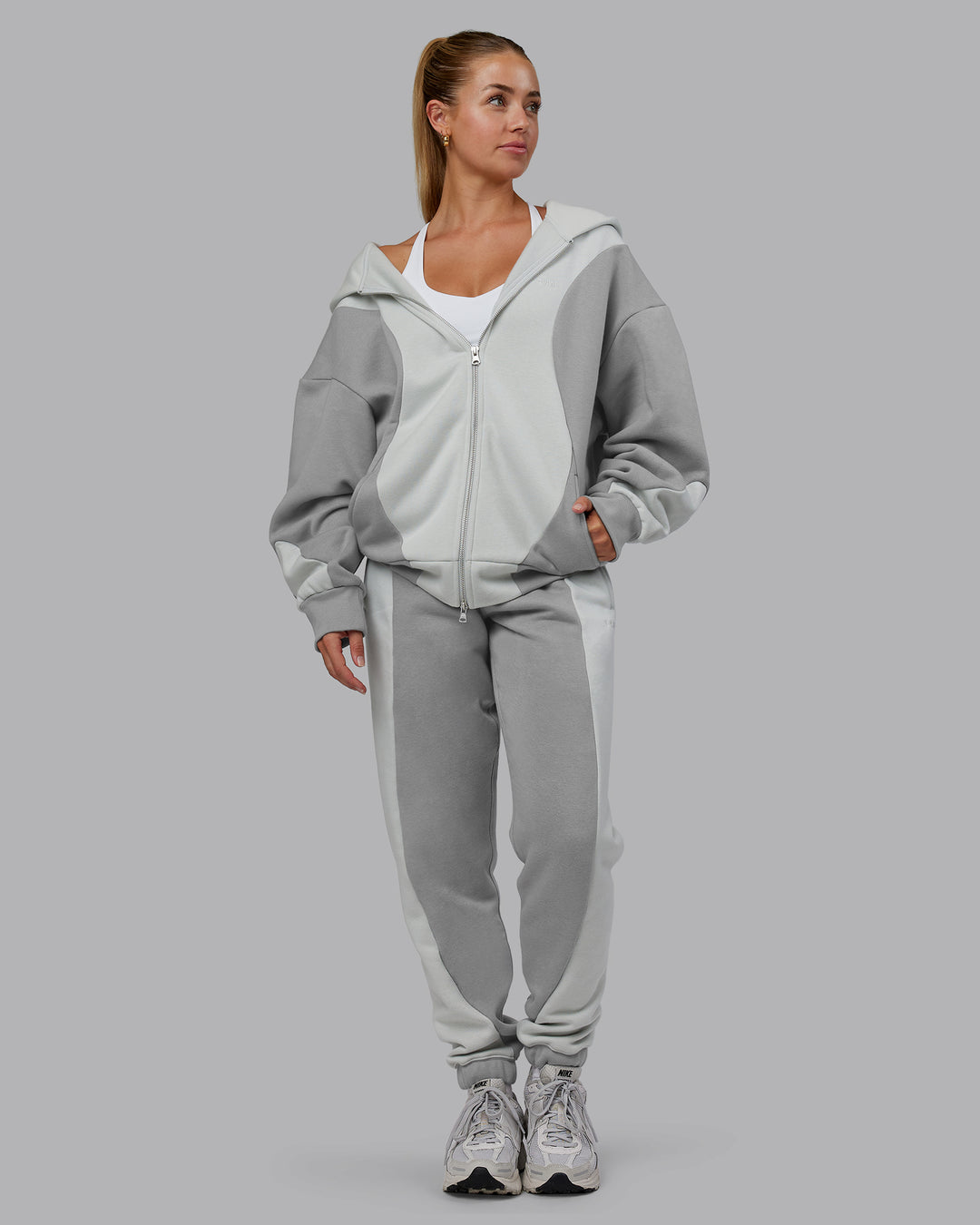 Woman wearing Stream Oversized Panel Zip Hoodie - Circular Grey-Digital Mist | Model:Hannah | Size:XS