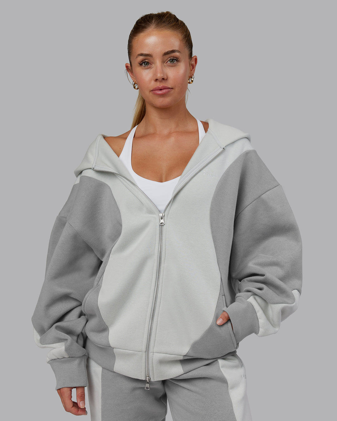 Woman wearing Stream Oversized Panel Zip Hoodie - Circular Grey-Digital Mist | Model:Hannah | Size:XS