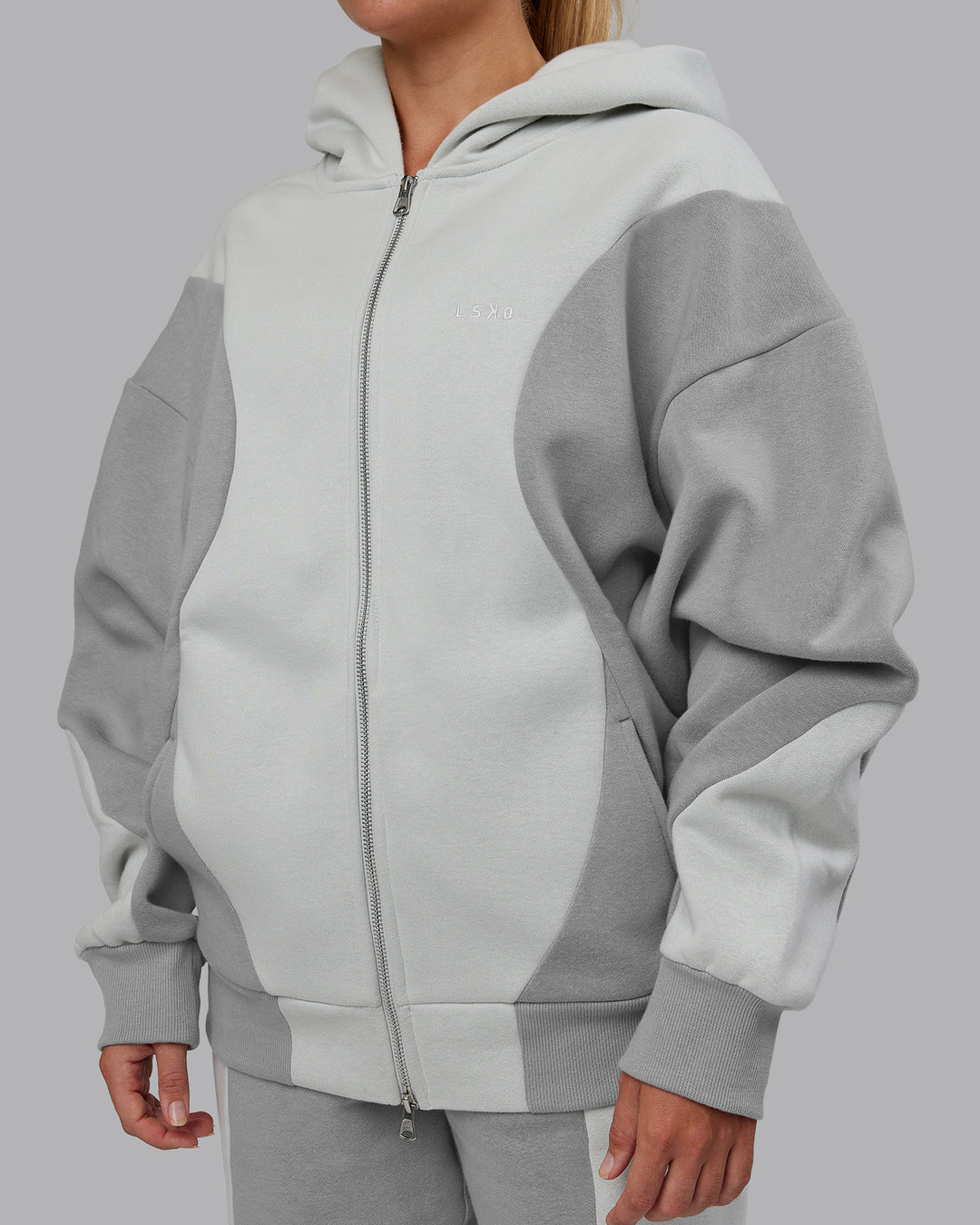 Woman wearing Stream Oversized Panel Zip Hoodie - Circular Grey-Digital Mist | Model:Hannah | Size:XS