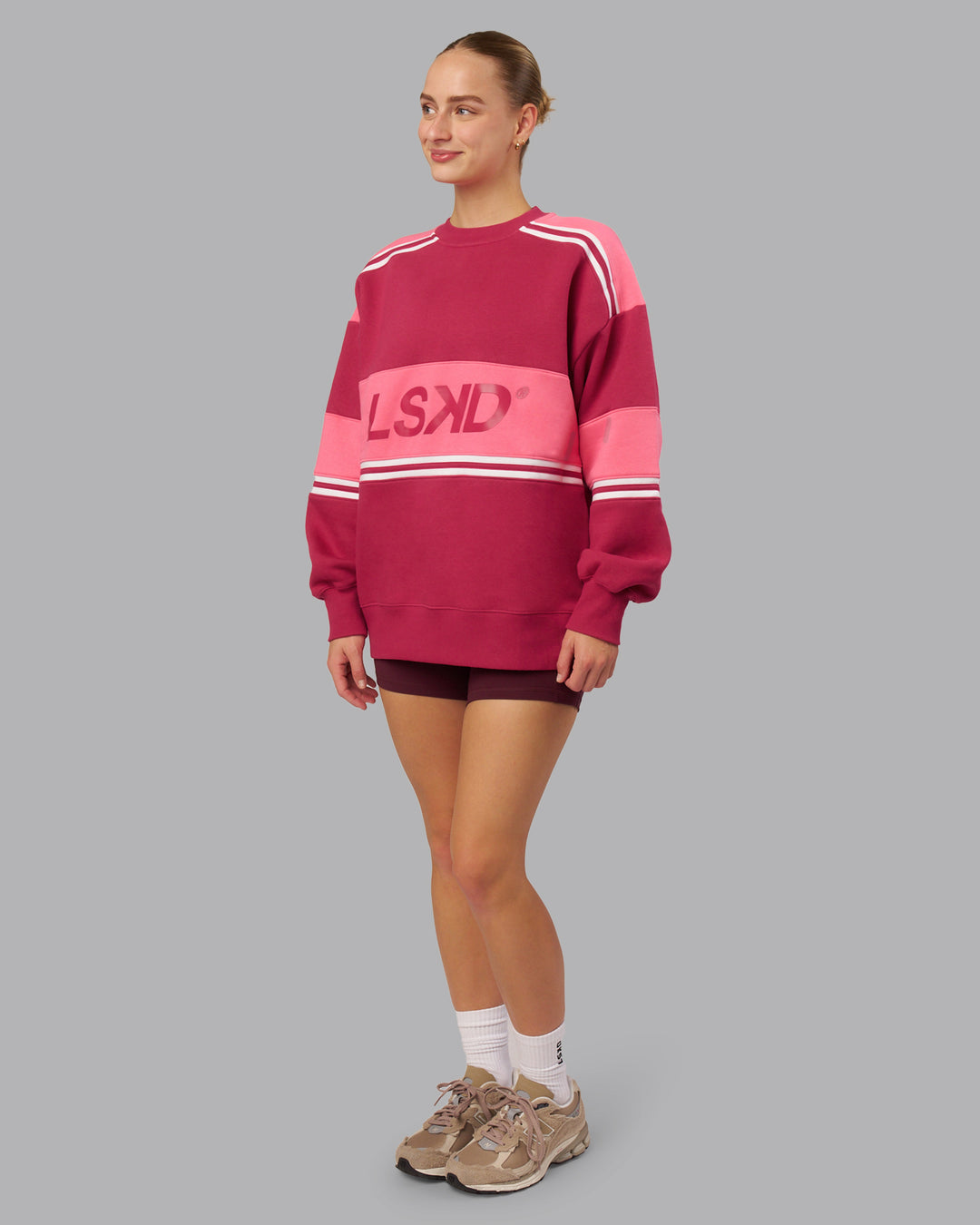 Woman wearing A-Team Sweater Oversize - Vivacious-Hot Pink | Model:Lillie | Size:XS