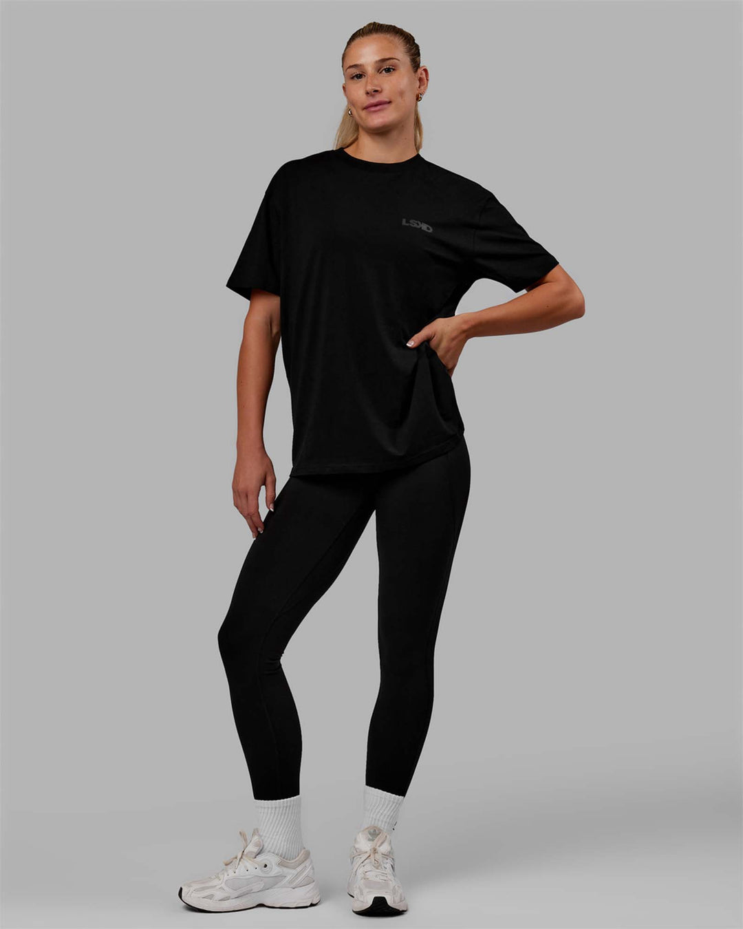Woman wearing Unisex E.T.J FLXCotton Tee Oversize - Black-Black
