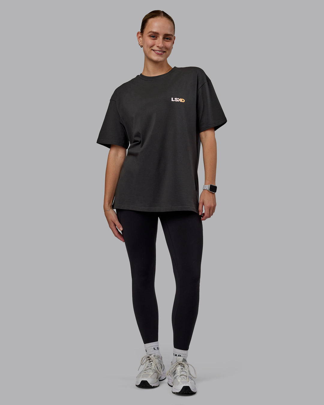 Woman wearing Unisex E.T.J FLXCotton Tee Oversize - Pirate Black-Pop Pink