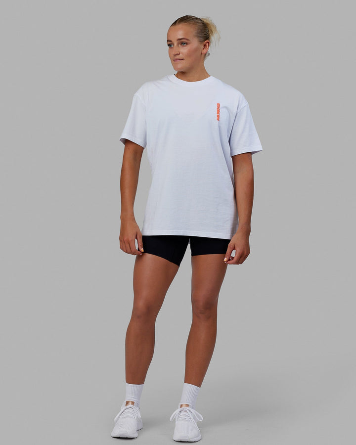 Woman wearing Unisex Good Times Global Heavyweight Tee Oversize - White-Red-Purple
