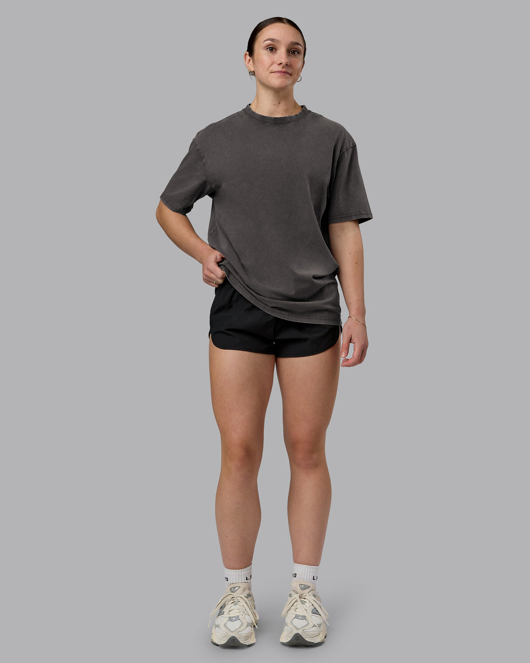 Woman wearing Heart FLXCotton Oversized Tee - Washed Dark Storm-Violet Ray | Model:Sav | Size:XS