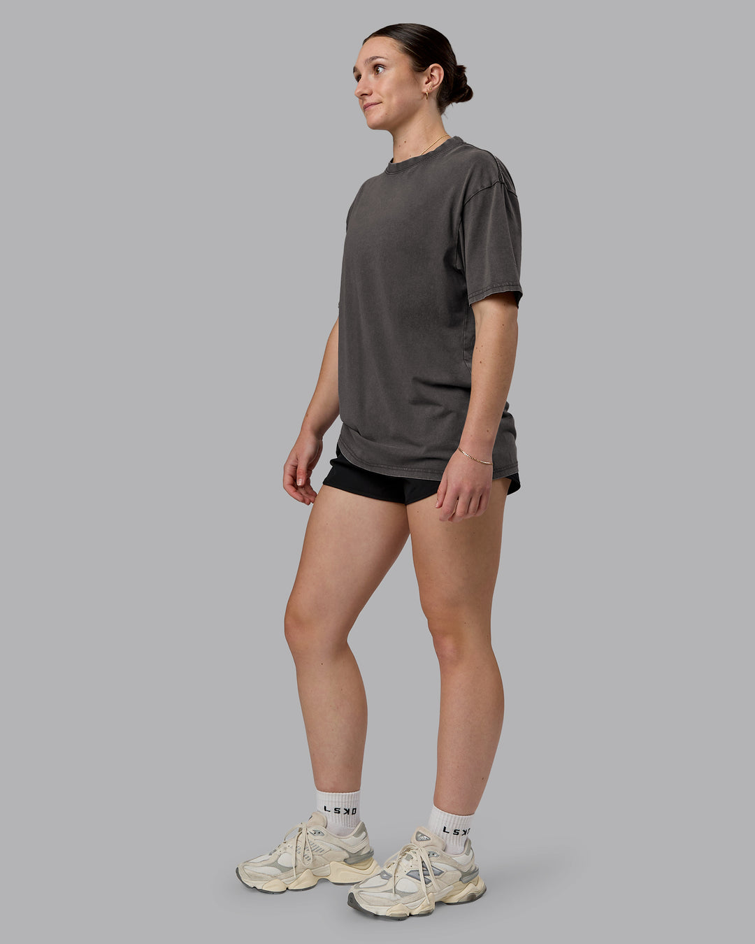 Woman wearing Heart FLXCotton Oversized Tee - Washed Dark Storm-Violet Ray | Model:Sav | Size:XS