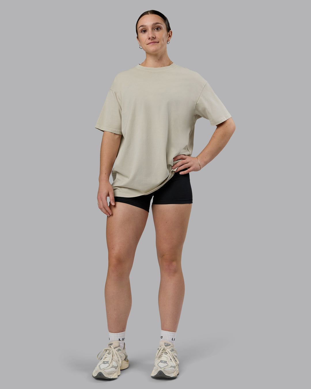 Woman wearing Heart FLXCotton Oversized Tee - Washed Shale Beige-White | Model:Sav | Size:XS