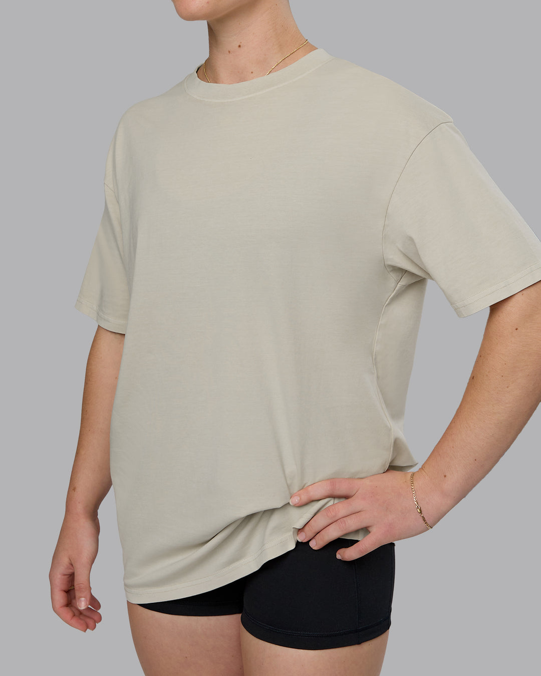 Woman wearing Heart FLXCotton Oversized Tee - Washed Shale Beige-White | Model:Sav | Size:XS