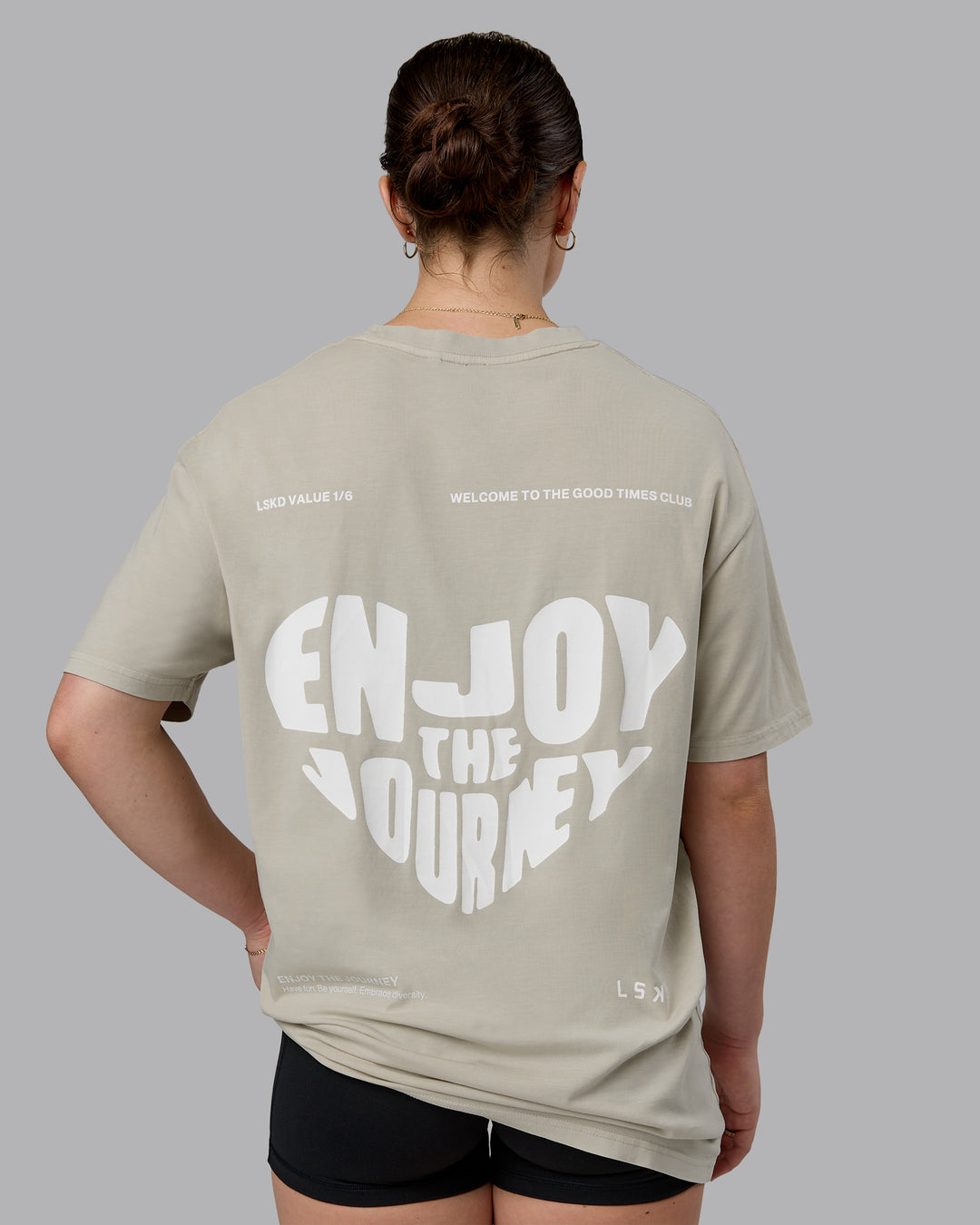 Woman wearing Heart FLXCotton Oversized Tee - Washed Shale Beige-White | Model:Sav | Size:XS