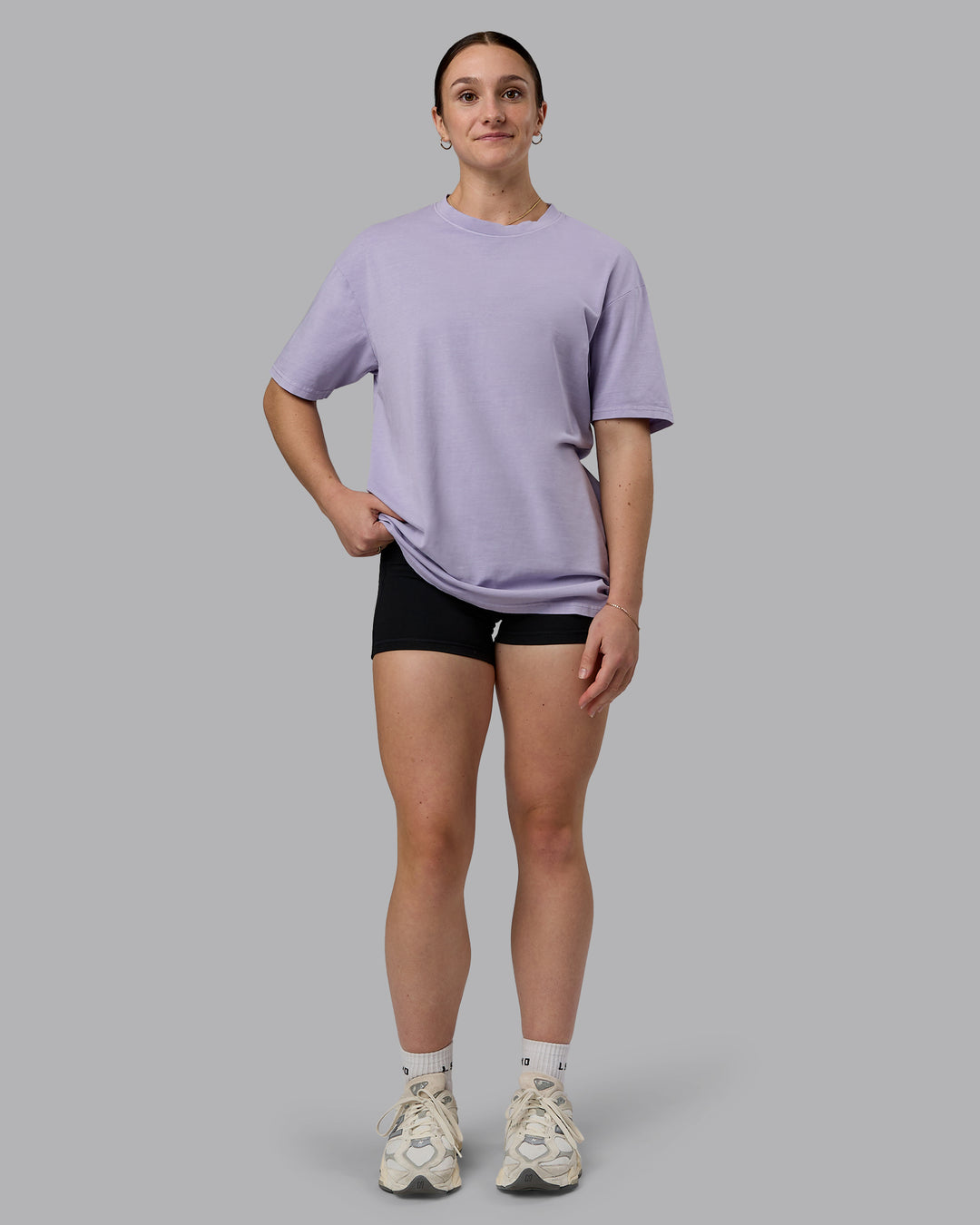Woman wearing Heart FLXCotton Oversized Tee - Washed Violet Ray-White | Model:Sav | Size:XS