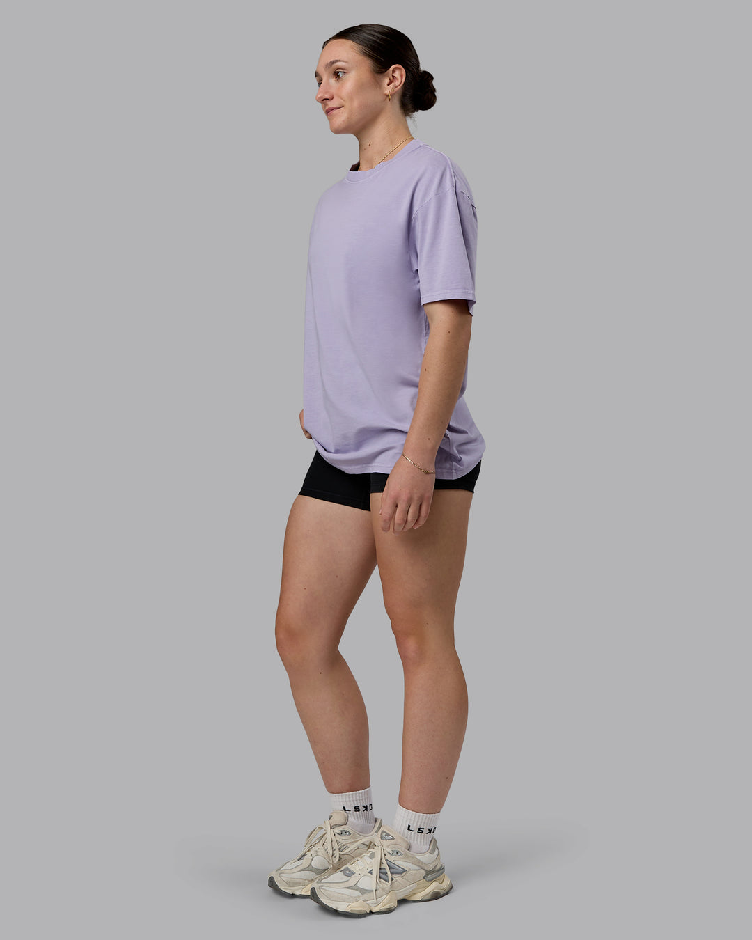 Woman wearing Heart FLXCotton Oversized Tee - Washed Violet Ray-White | Model:Sav | Size:XS