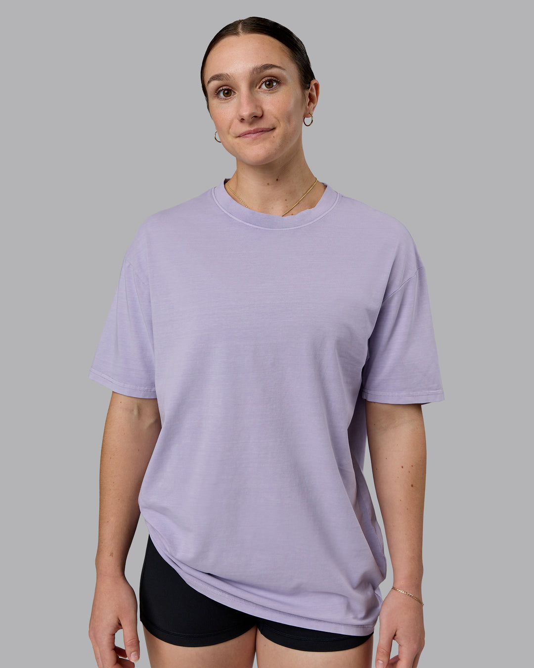 Woman wearing Heart FLXCotton Oversized Tee - Washed Violet Ray-White | Model:Sav | Size:XS