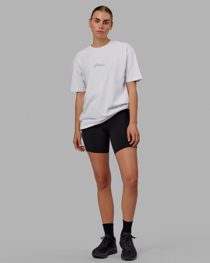 Woman wearing Unisex Mad Happy Heavyweight Tee Oversize - White