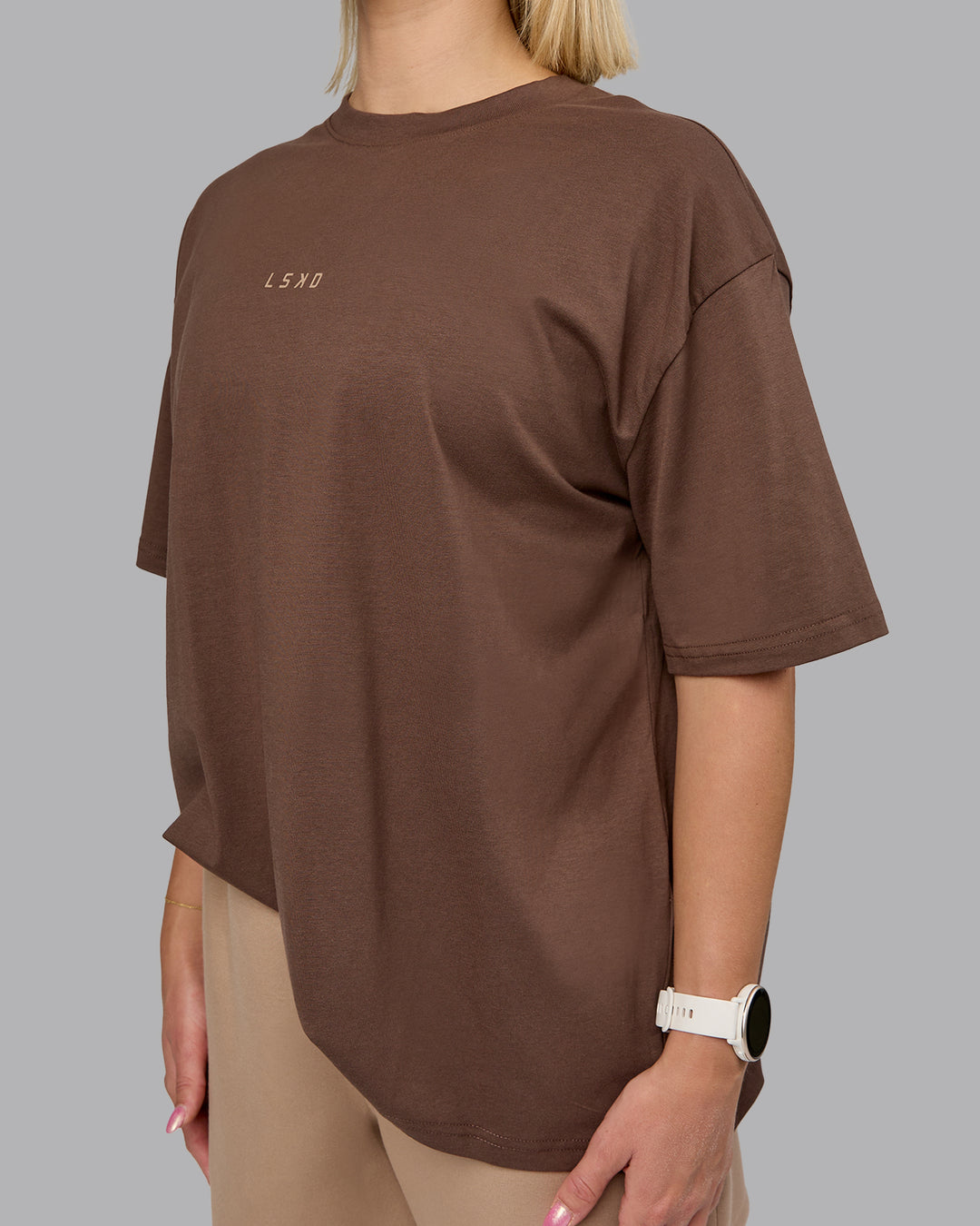 Woman wearing On Repeat FLXCotton Oversized Tee - Chocolate Martini-Taupe | Model:Halle | Size:S