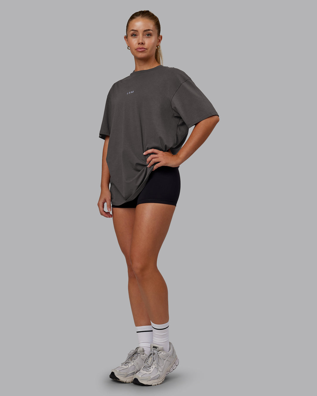 Woman wearing On Repeat FLXCotton Oversized Tee - Dark Storm-Sweet Lavender | Model:Hannah | Size:XS