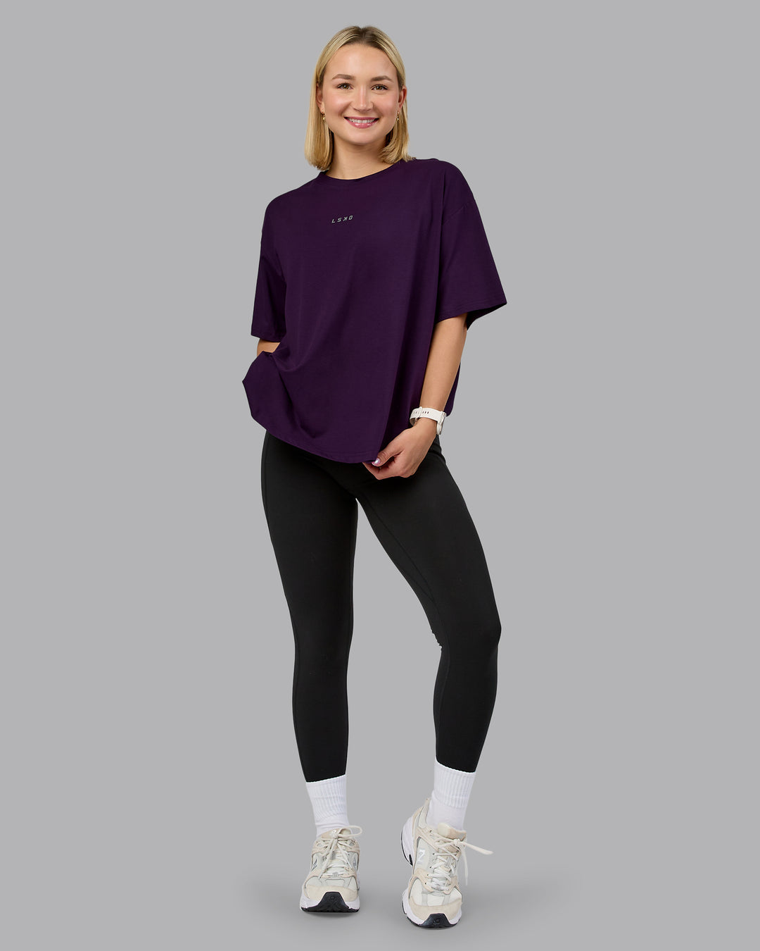 Woman wearing On Repeat FLXCotton Oversized Tee - Deep Purple-Lilac Smoke | Model:Halle | Size:S