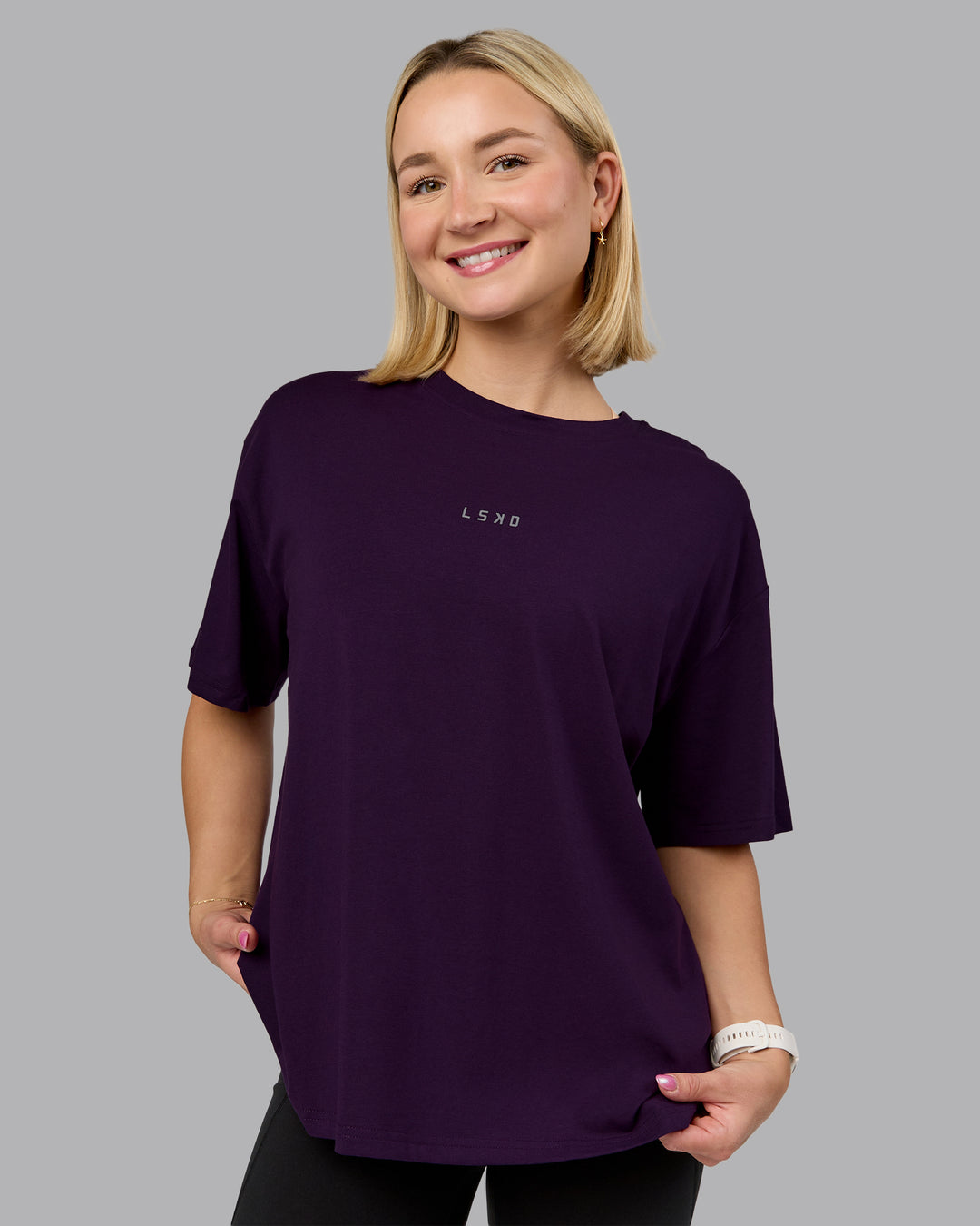 Woman wearing On Repeat FLXCotton Oversized Tee - Deep Purple-Lilac Smoke | Model:Halle | Size:S