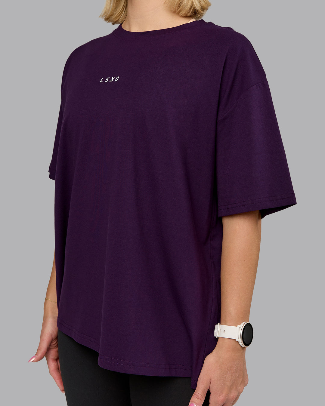 Woman wearing On Repeat FLXCotton Oversized Tee - Deep Purple-Lilac Smoke | Model:Halle | Size:S